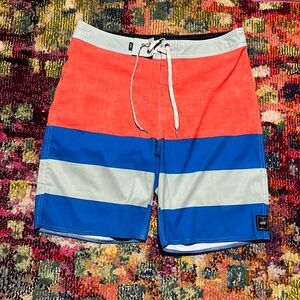 Vans board shorts men’s size 32. Orange and blue perfect condition.